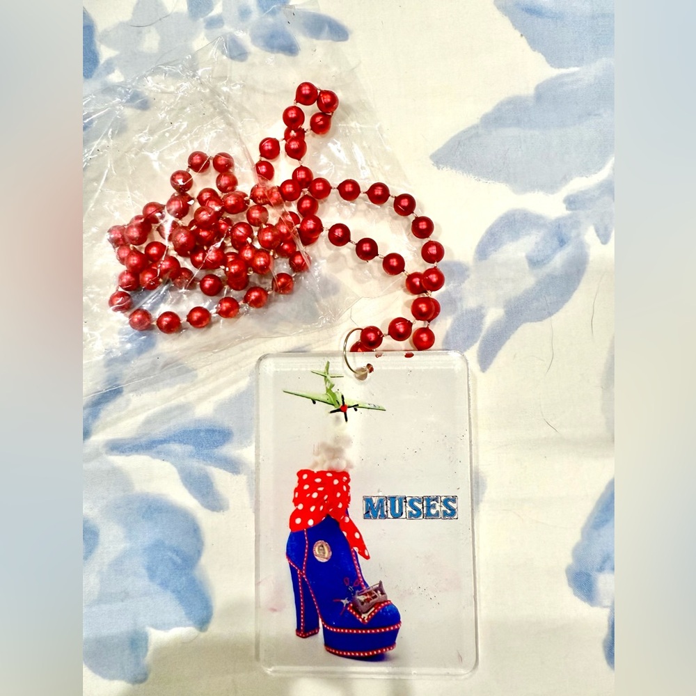 Crewe of Muses 2025 New Red and Blue Mardi Gras Beads, with magnetic medal.